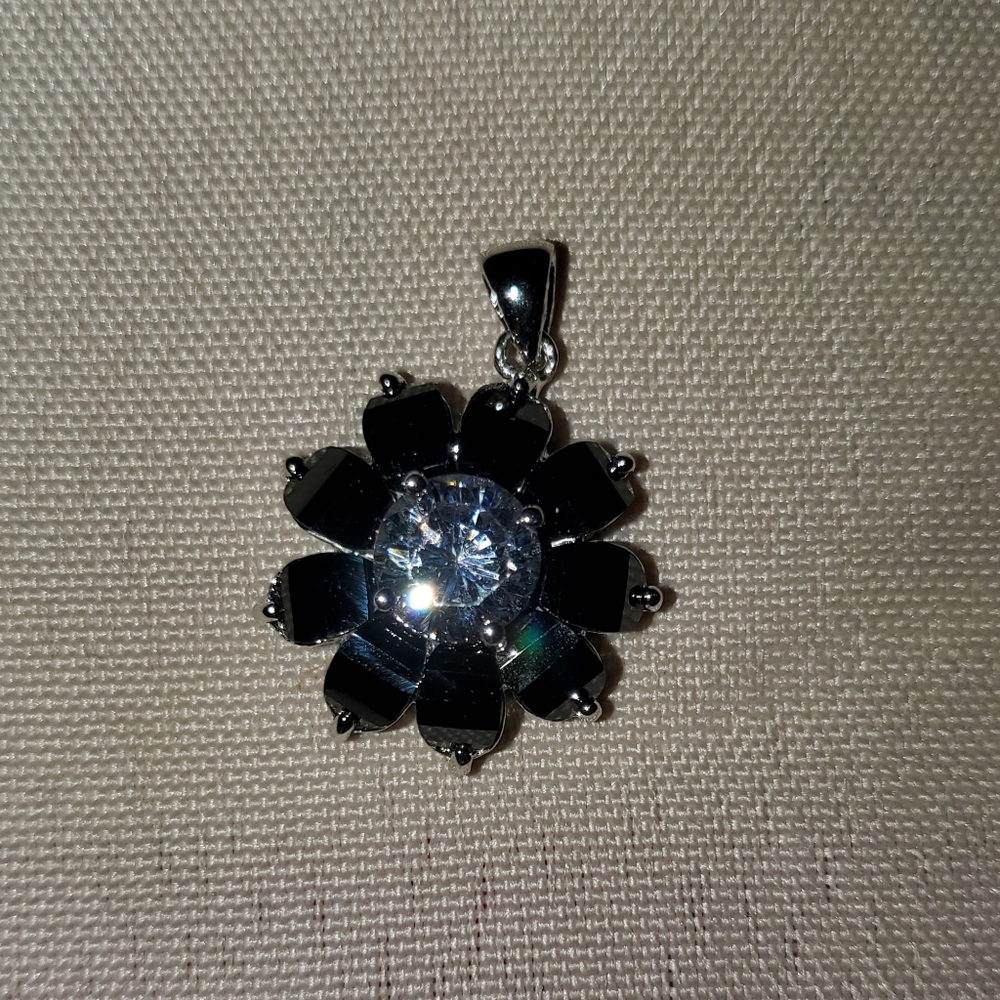 NWOT Sterling silver black onyx flower with large 1 Carat center CZ.
